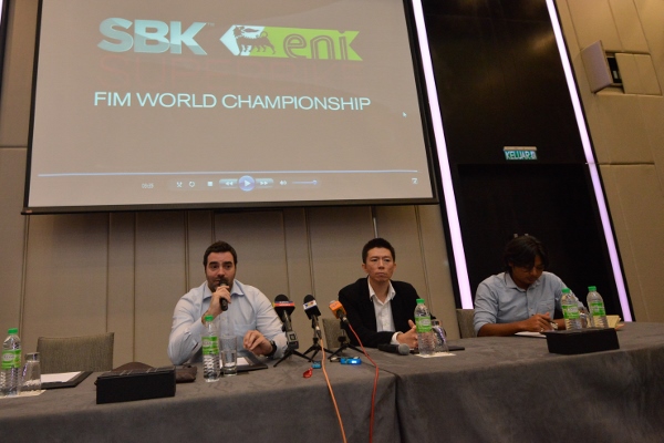 Saurina (right) speaks to members of the media at the meet as Lim (second from right) listens. 