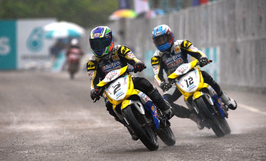 Norizman Ismail 2 and Zamri Baba 12 during the CP130 race in Kluang