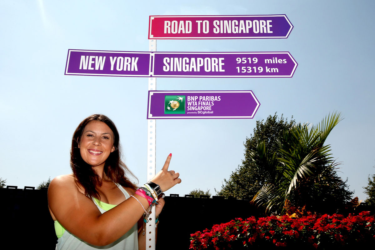 Marion Bartoli, the 2013 Wimbledon champion, has been named as the 3rd playing legend in the WTA Legends Finals to be held in Singapore in October 2014. Photo Credit: Getty Images