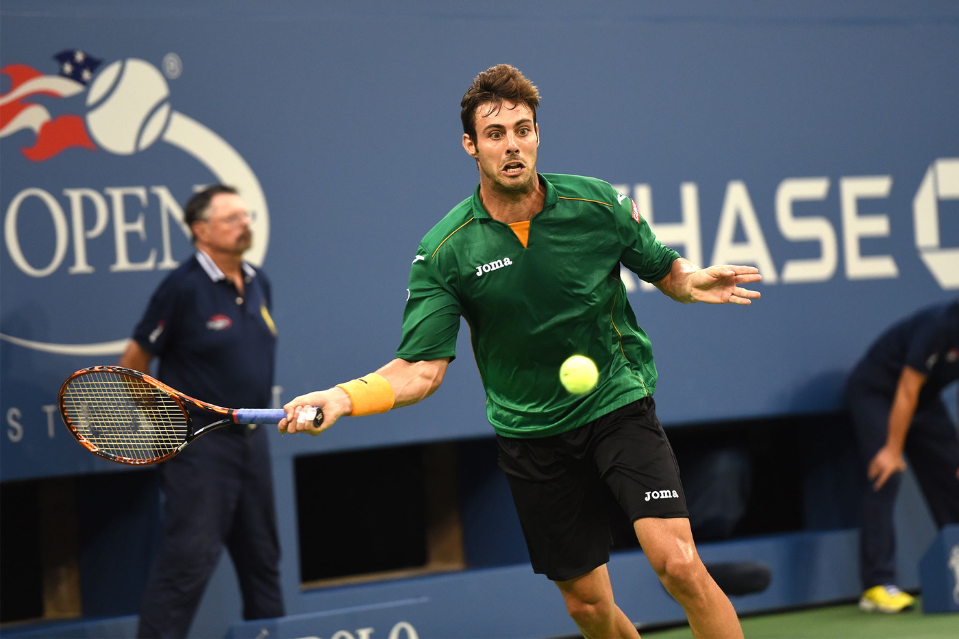 Marcel Granollers attacks a forehand during a third-round match against Roger Federer in Arthur Ashe Stadium. - Photo Credit: Andrew Ong/usopen.org
