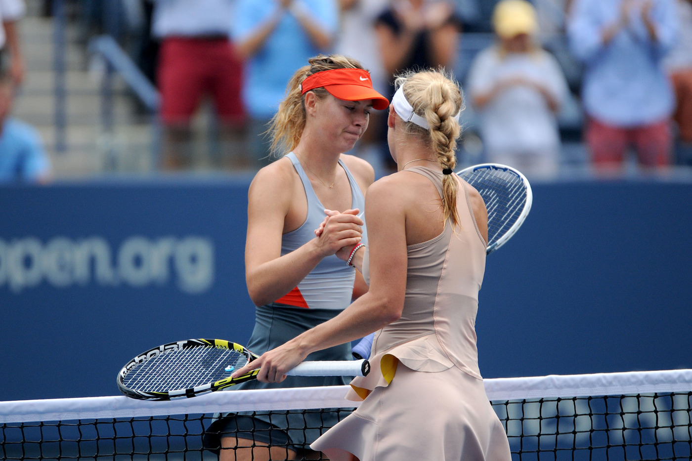 Tenth seed Caroline Wozniacki, the 2009 runner-up, defeats No. 5 Maria Sharapova in the fourth round 6-4, 2-6, 6-2. - Photo credit: Mike Lawrence/usopen.org
