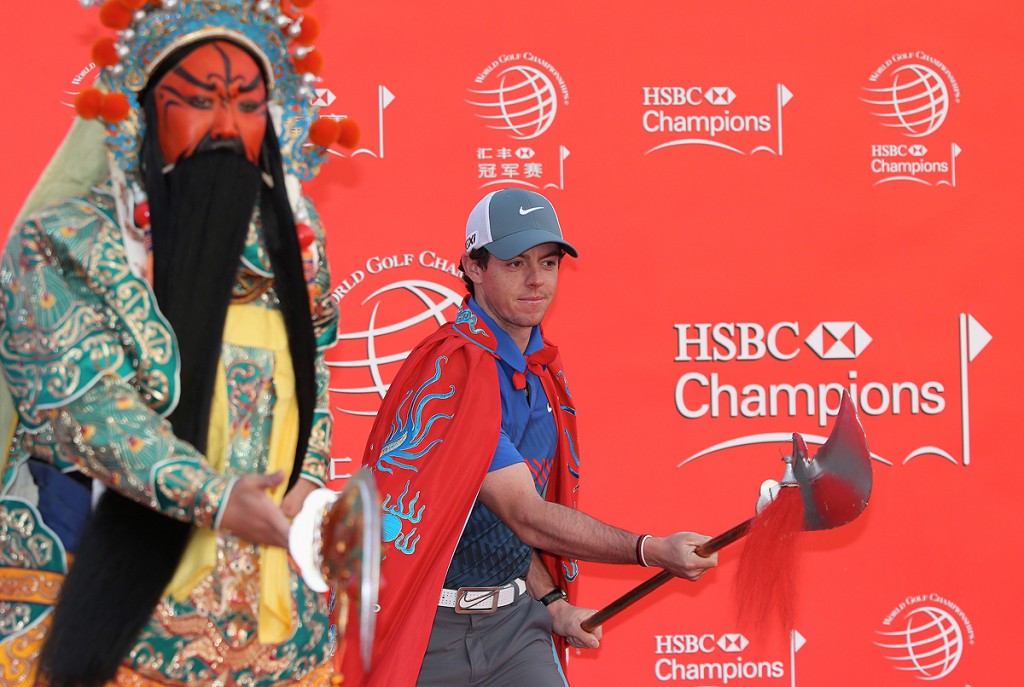 SHANGHAI, CHINA - OCTOBER 29: Rory McIlroy of Northern Ireland and a Chinese Warrior pose during a photocall prior to the start of the WGC-HSBC Champions at the Peninsula Hotel on October 29, 2013 in Shanghai, China. (Photo by Andrew Redington/Getty Images)