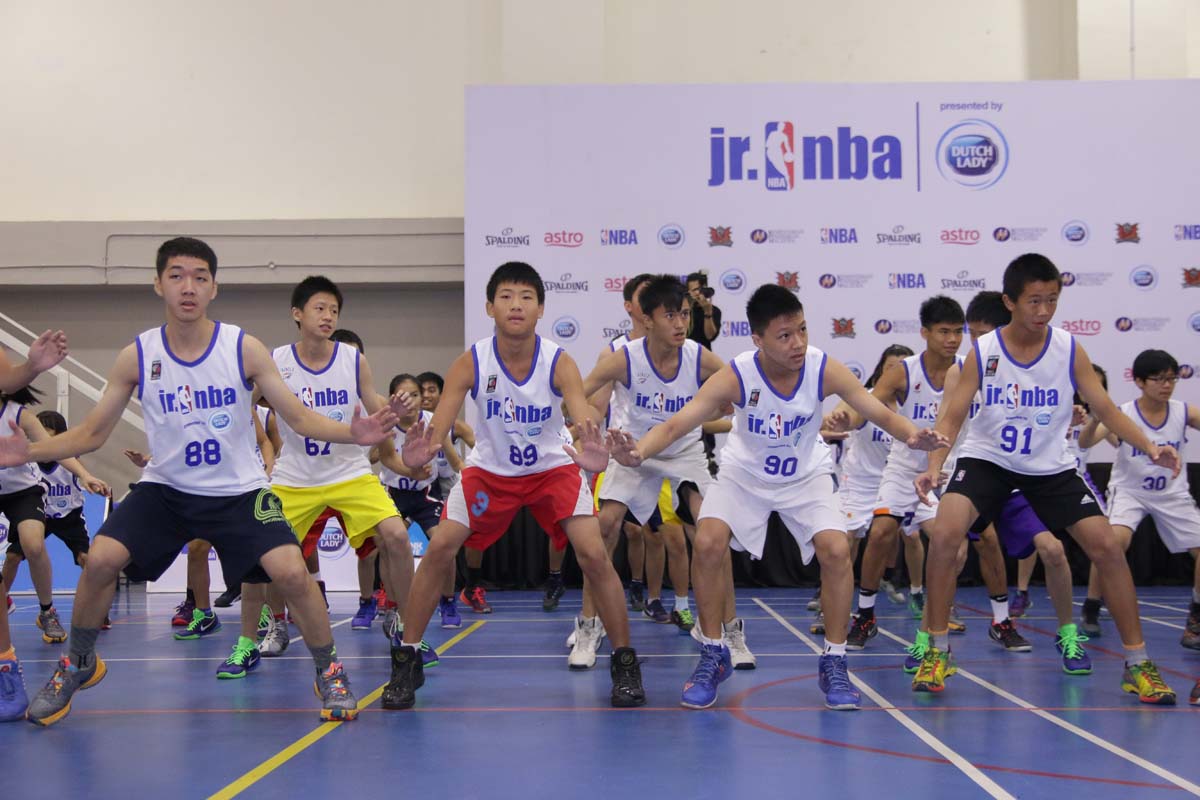 Participants going through the warmup session at the Jr. NBA Malaysia 2016 presented by Dutch Lady Regional Selection Camp.