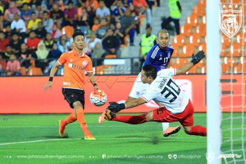 Felda see red as champions JDT stretch lead for Super League title