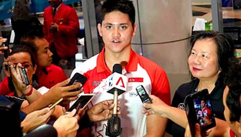 Schooling apologises and thanks Khairy