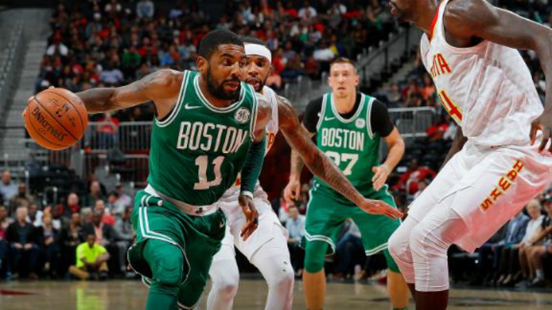 Irving stars as Celtics roll on, Warriors chill Heat